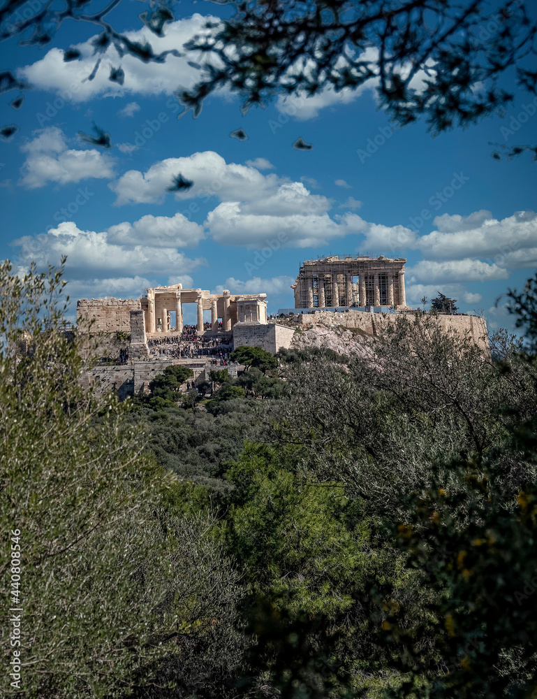 Parthenon on Acropolis of Athens Greece, under blue sky with some white clouds