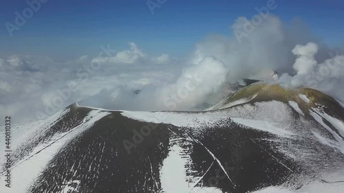 Mount Etna on Sicily Island, Italy. Aerial view of Etna volcano in winter, January 2019.