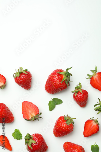 Fresh tasty strawberry with leaves on white background