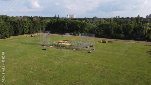 installation of a stage for a concert in the park aerial filming video photo