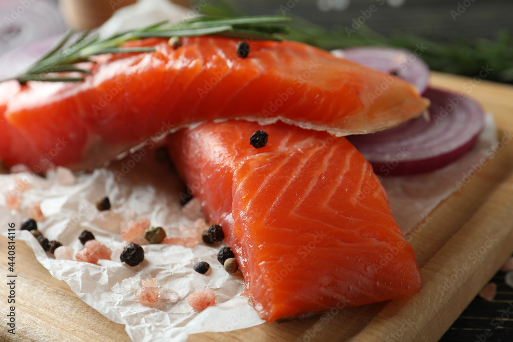 Fresh raw salmon and ingredients for cooking, close up Fresh raw salmon and ingredients for cooking, close up