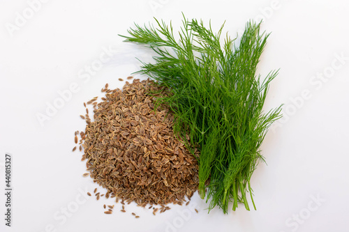 Dill seeds on a white background.
Healthy products concept.