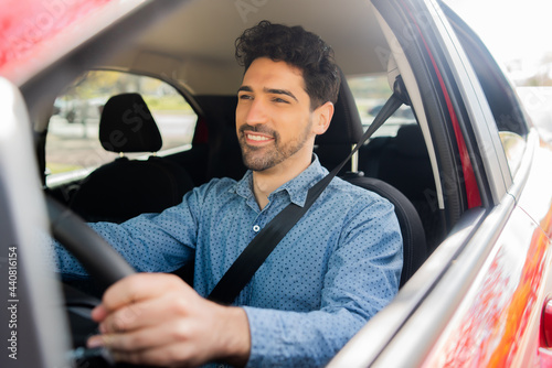 Wallpaper Mural Man driving his car on way to work. Torontodigital.ca