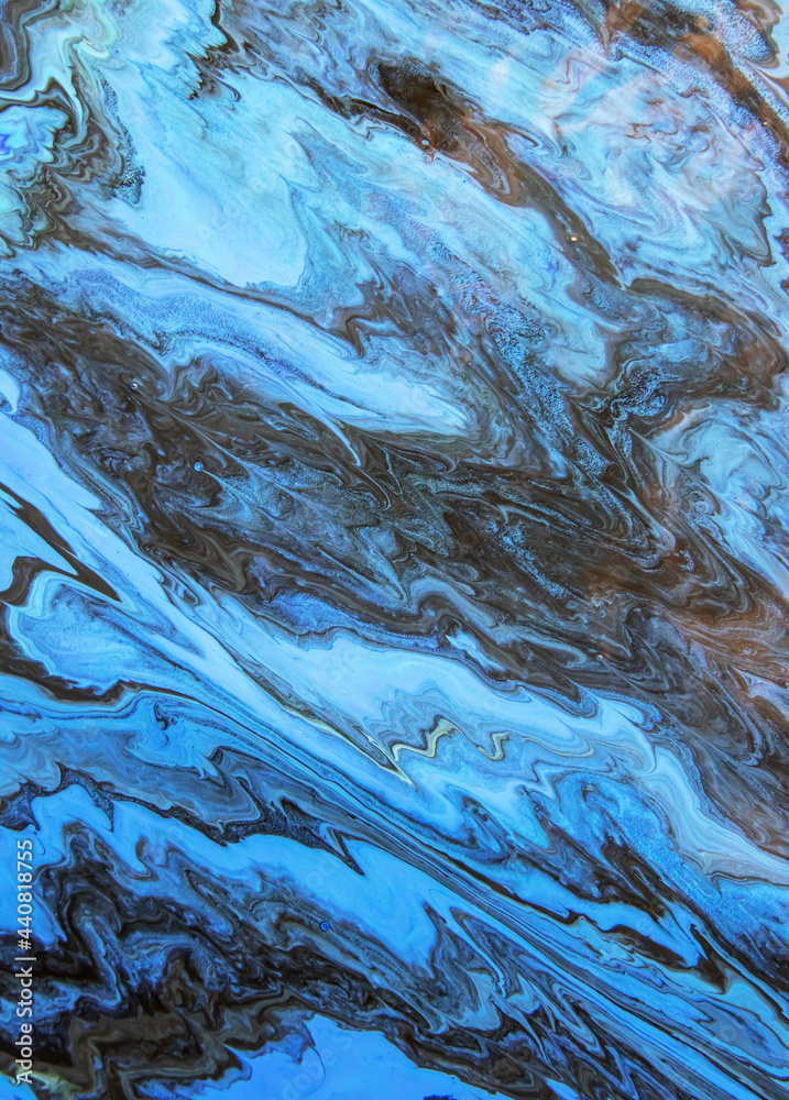 Obraz premium Black and blue streaks of paint. Abstract background with marble effect