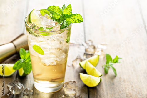 Refreshing summer cocktail with ginger beer and lime
