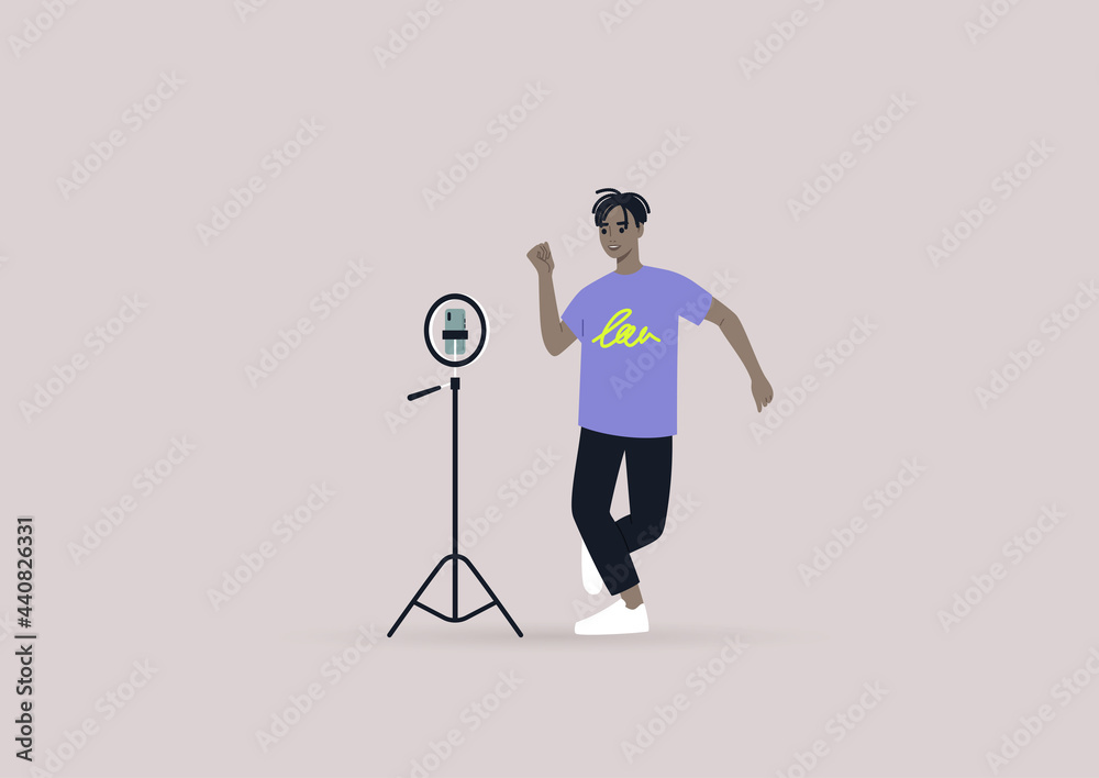 Fototapeta premium A young male Black character recording a dancing challenge video with their mobile phone on a tripod, modern gen z lifestyle