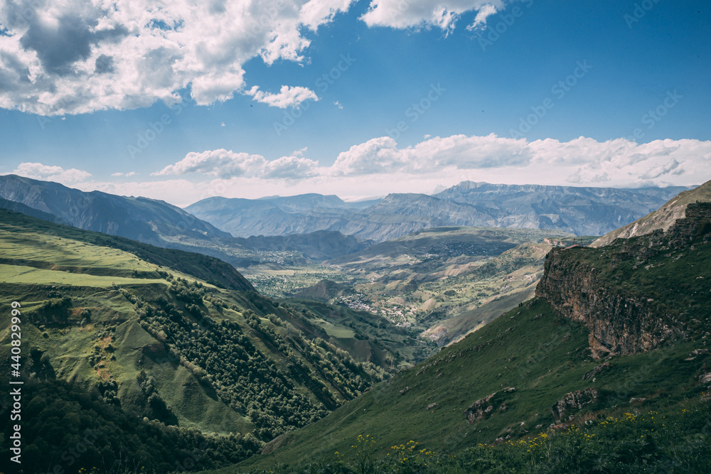 Fototapeta premium Dagestan traditional highland village Danukh with green terraces in Caucasus Mountains. Rural mountain scenery in Russia