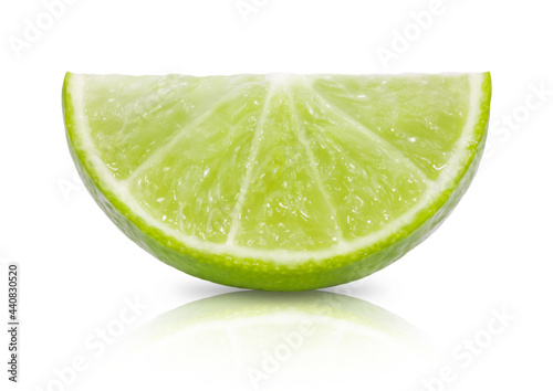 Ripe juicy lime and slices isolated on white background. Fresh fruits.
