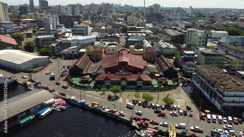 Aerial view of the public municipal market Adolpho Lisboa, located in central Manaus, Amazonas state, Brazil. Negro River is seen in the bottom. photo