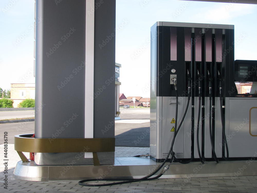 An empty gas station in front of the far road. An empty gas station in front of the far road.