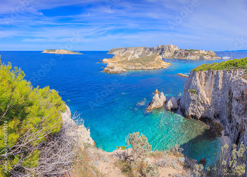 Fototapeta Naklejka Na Ścianę i Meble -  Seascape of Tremiti archipelago with Pagliai cliffs in San Domino island, Cretaccio  and San Nicola and Capraia islands in background.	