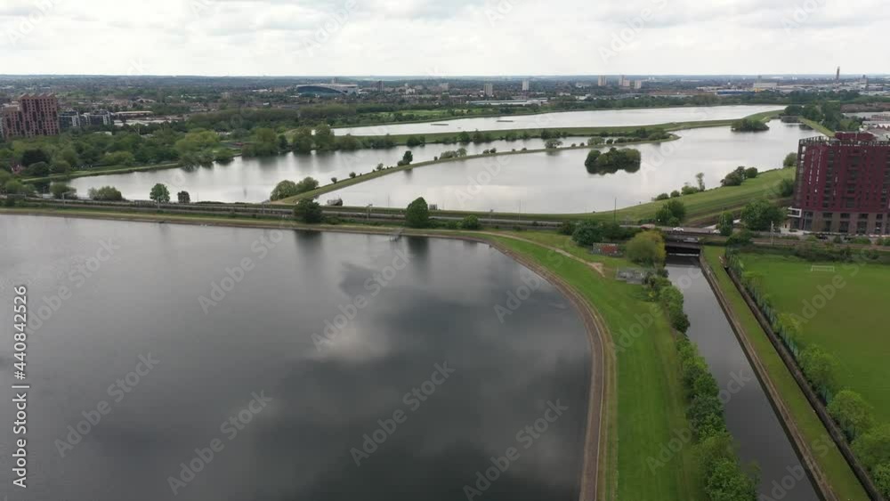 Aerial drone view of Reservoirs. Calm water surface reflecting grey sky with clouds Aerial drone view of Reservoirs. Calm water surface reflecting grey sky with clouds