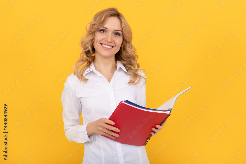 businesswoman. making notes. cheerful woman in white shirt. office worker with notebook businesswoman. making notes. cheerful woman in white shirt. office worker with notebook