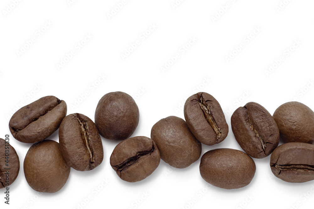 Fresh roasted coffee beans with leaves, isolated on white background Fresh roasted coffee beans with leaves, isolated on white background