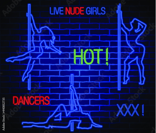 Neon silhouette girls at a pylon.Live nude girl neon sign photo