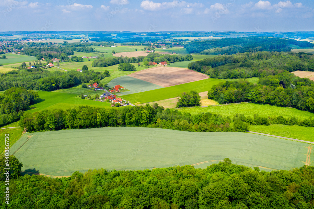 Aerial view from the drone of landscape of the German countryside. Agricultural fields, villages, and woodlands. Aerial view from the drone of landscape of the German countryside. Agricultural fields, villages, and woodlands.