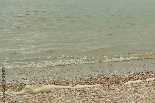 Small waves on a beach of the North Sea photo