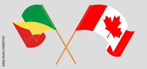 Crossed and waving flags of Republic of the Congo and Canada