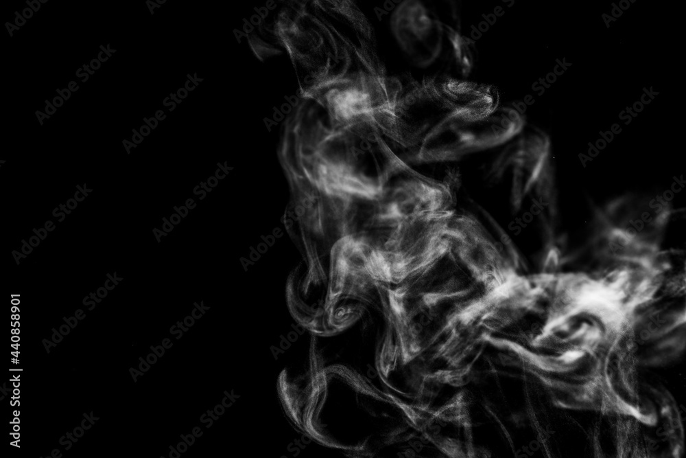 White steam smoke on solid black background with abstract blur motion wave swirl use as an overlay effect for vapor cigarette dry ice hot water and food soup White steam smoke on solid black background with abstract blur motion wave swirl use as an overlay effect for vapor cigarette dry ice hot water and food soup