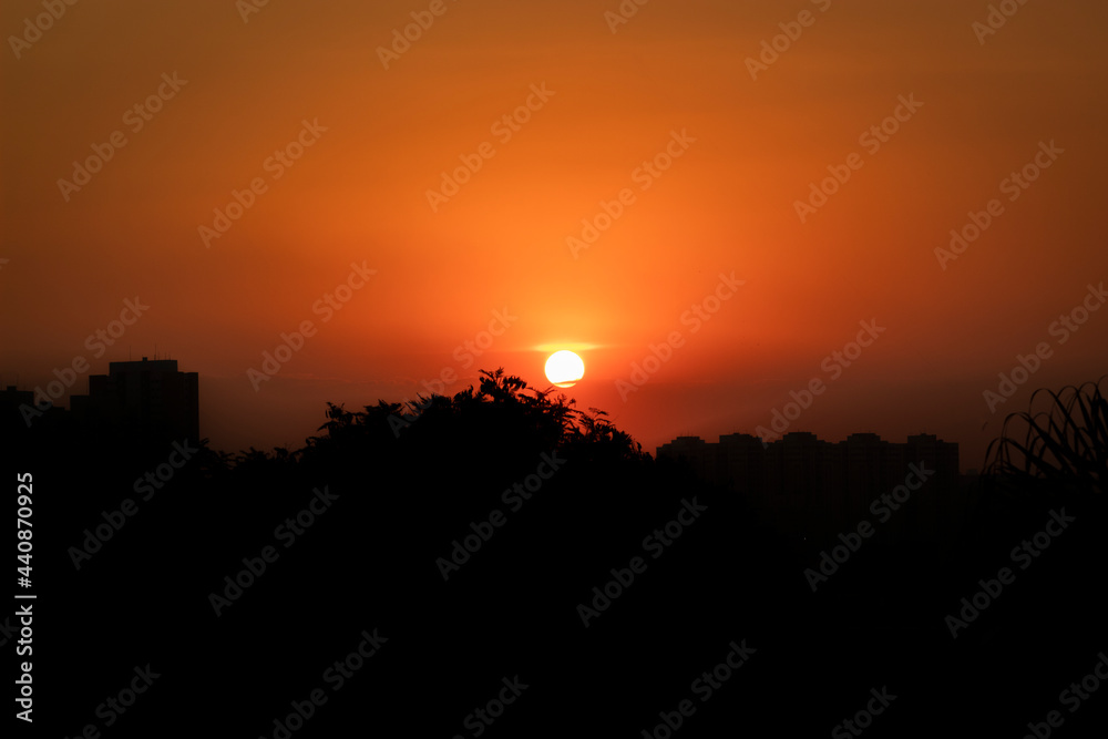 Sunset landscape with brighty sun