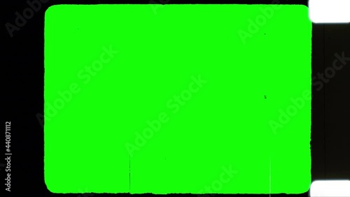 16mm Filmstrip. Seamless 4k loop of an aged celluloid filmstrip. Green screen masked for easy chroma key.