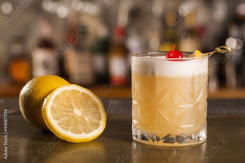 Amaretto Sour drink in a bar environment photo