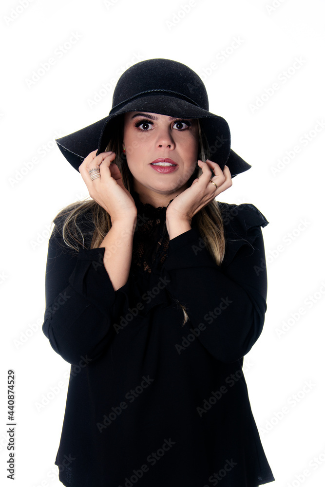 blonde woman wearing black outfit on white background with hat blonde woman wearing black outfit on white background with hat