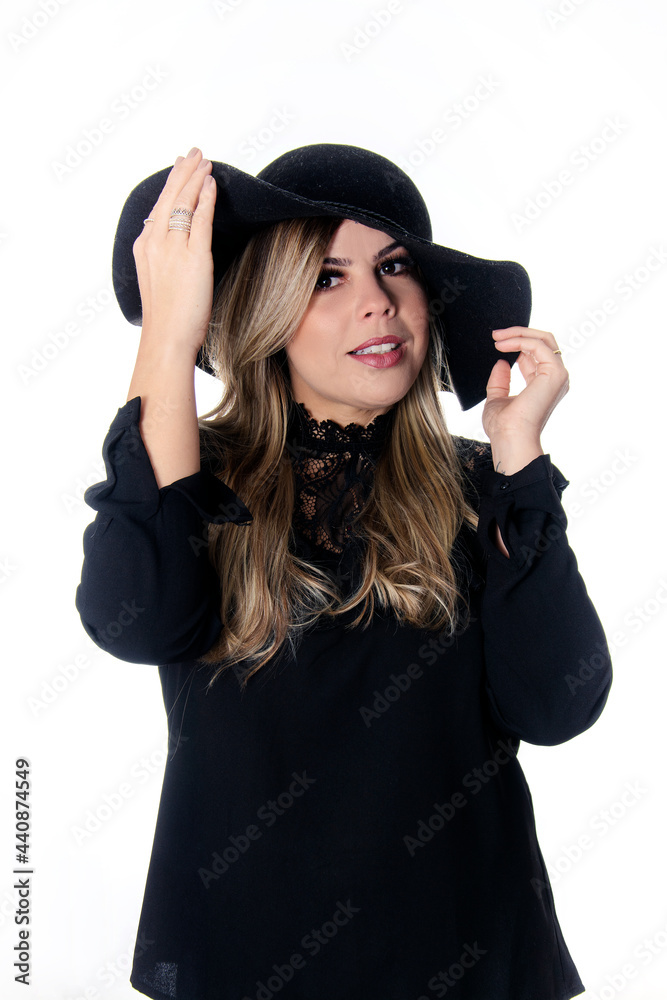 blonde woman wearing black outfit on white background with hat blonde woman wearing black outfit on white background with hat