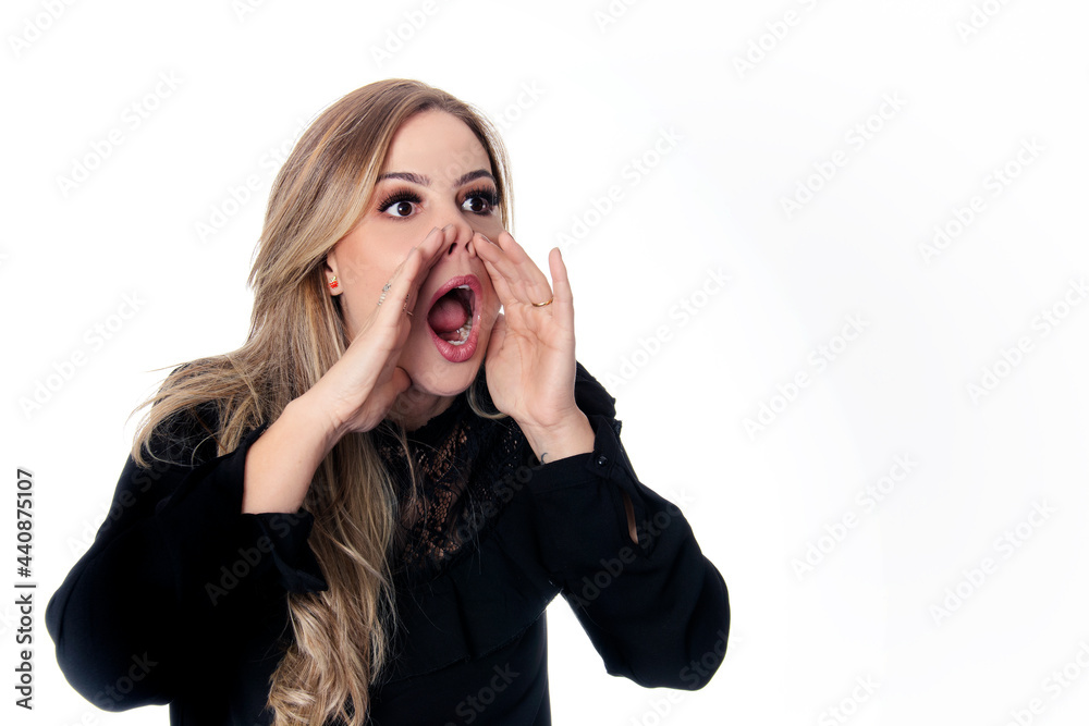 blonde woman calling wearing black outfit on white background blonde woman calling wearing black outfit on white background