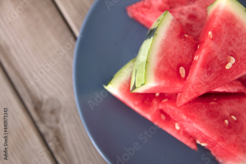 Watermelon cut into small pieces on a plate