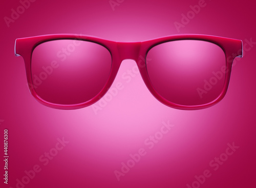 Modern red glasses on a red background