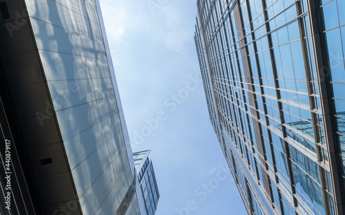 Chengdu cityscape low angle view of modern office building with clouds blue sky 