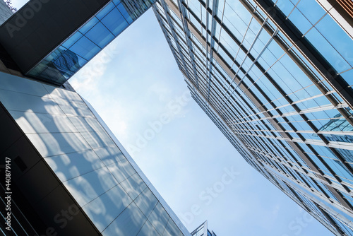 Chengdu cityscape low angle view of modern office building with clouds blue sky 