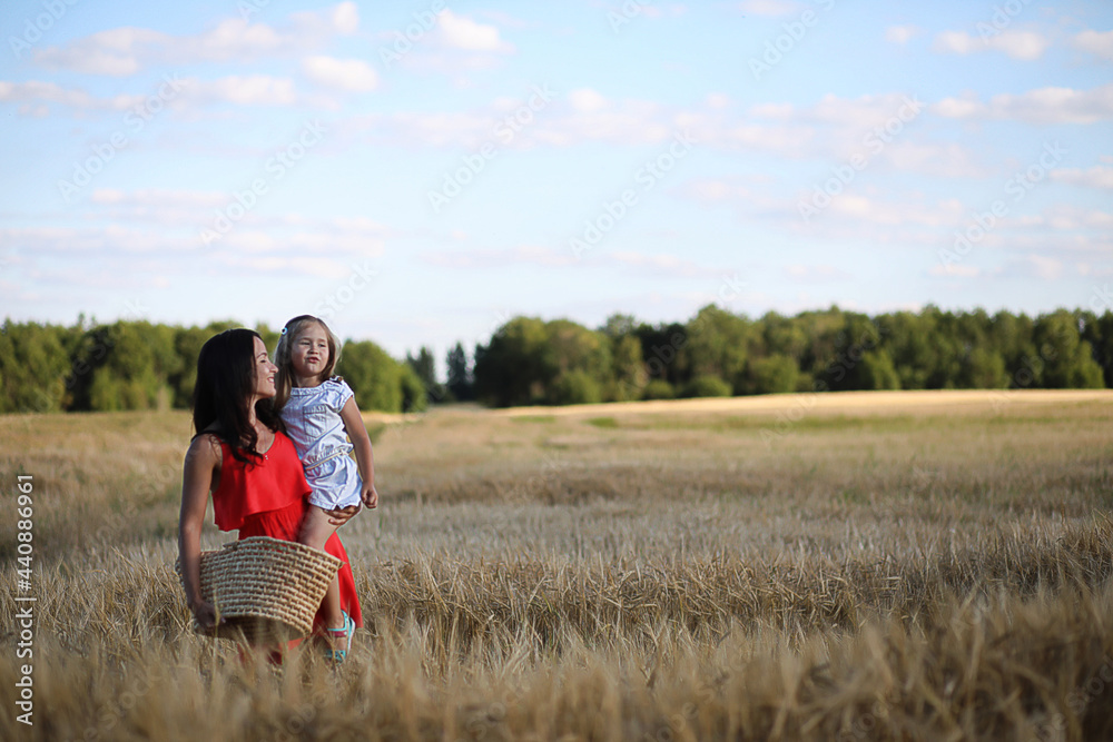 Summer landscape and a girl on nature walk in the countryside. Summer landscape and a girl on nature walk in the countryside.