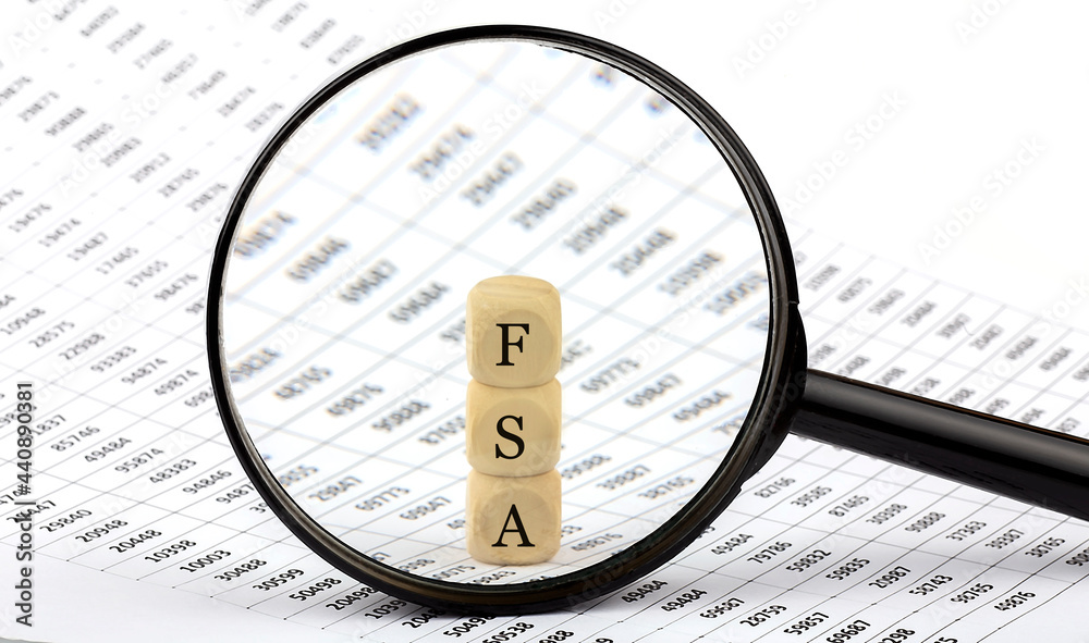FSA wooden cubes on chart background , look through a magnifier Stock ...