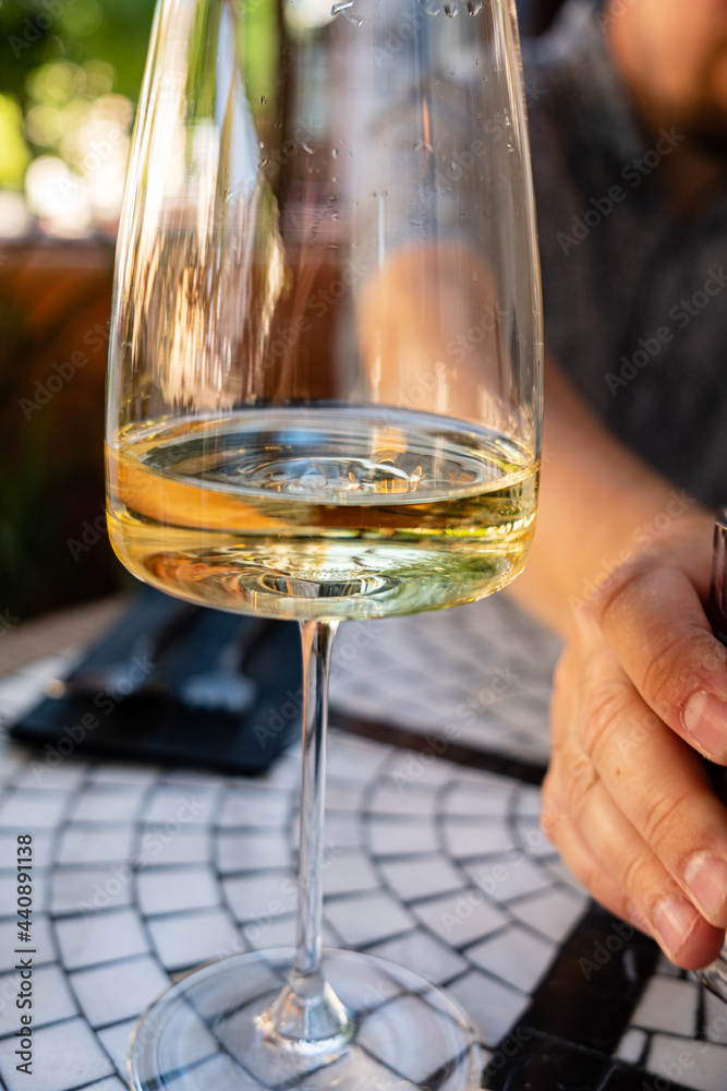 Obraz premium white wine in the cafe