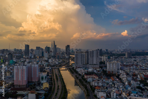 Sunset along the canal looking towards the city center of Saigon  Ho Chi Minh City  Vietnam