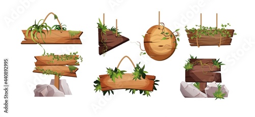 Empty wooden planks hanging on ropes with liana branches and tropical leaves. Set of vintage, retro banners for game. Cartoon vector illustration.