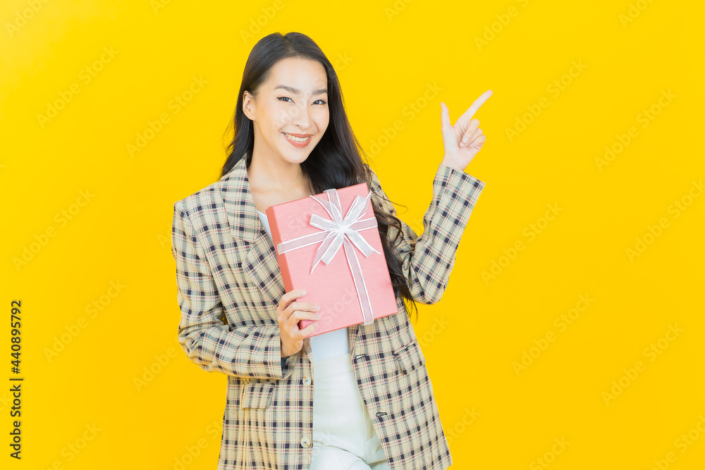 Portrait beautiful young asian woman smile with red gift box Portrait beautiful young asian woman smile with red gift box