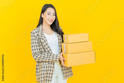 Portrait beautiful young asian woman with box ready for shipping © siraphol