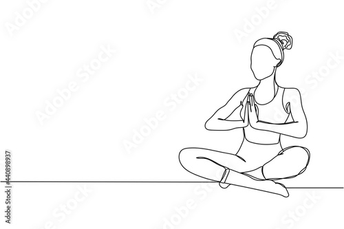 Continuous one line of woman practicing yoga in silhouette on a white background. Linear stylized.Minimalist.