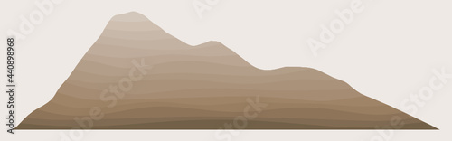 Brown layered mountain. Bedded hill. Sedimentary strata.