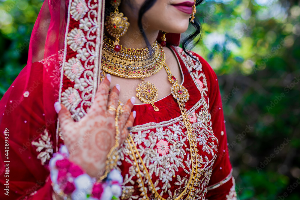 Indian bride's wearing her jewellery necklace close up