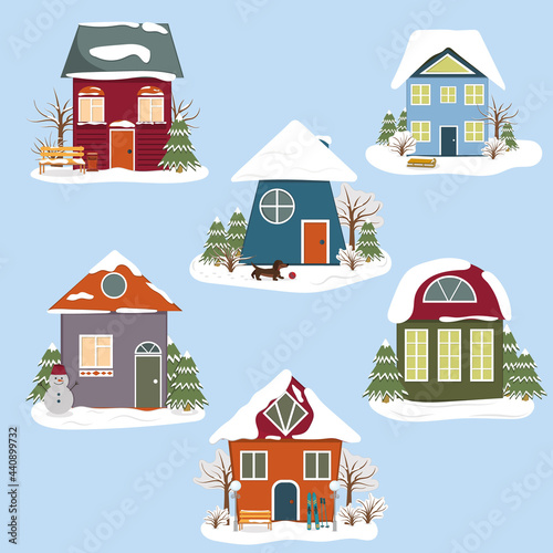 Set of winter Christmas isolated houses on a blue background, color vector illustration