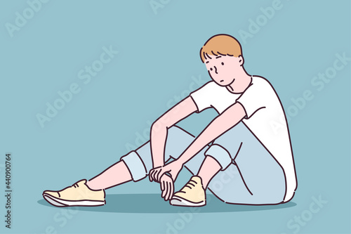 A man is sitting with a thoughtful expression. hand drawn style vector design illustrations. 