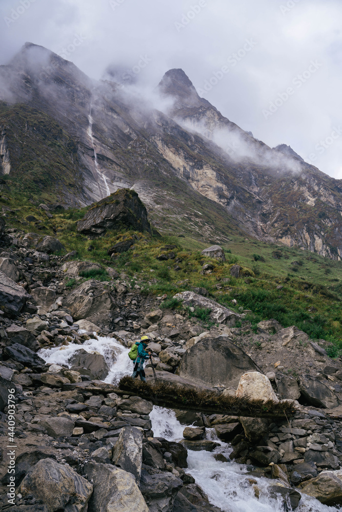 The woman trekking on the way to Annapurna base camp. The woman trekking on the way to Annapurna base camp.