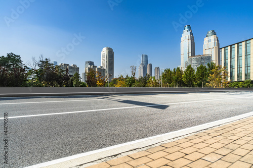 empty urban road with modern building in the city