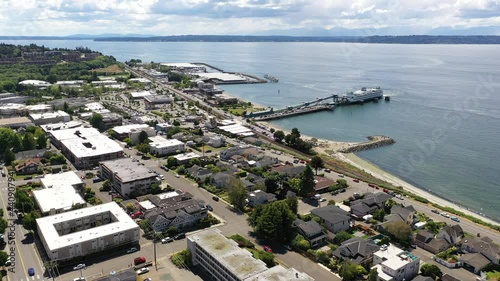 Cinematic 4K drone dolly clip of the downtown Edmonds commercial area, Kingston ferry terminal waterfront marina, near Seattle in Western Washington, Pacific Northwest, in Snohomish County photo