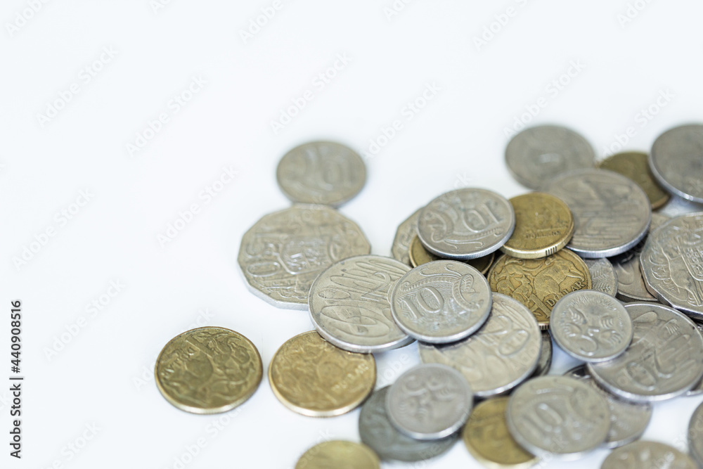 Scattered Australian coins on white Scattered Australian coins on white