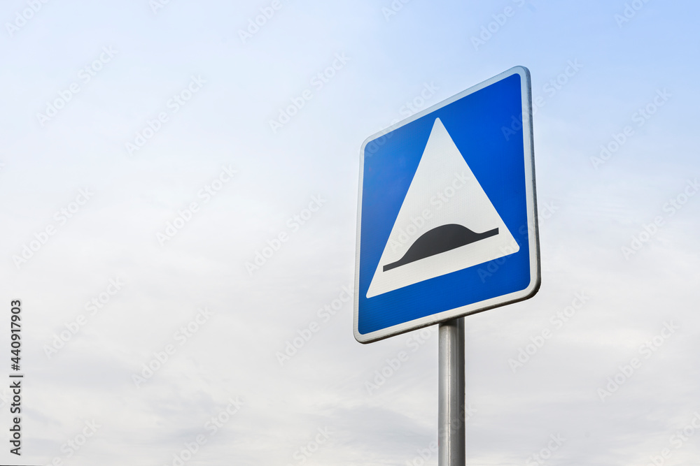 road sign speed bump on sky background, copy space road sign speed bump on sky background, copy space